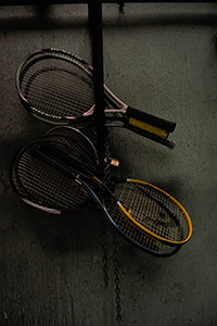 Tennis rackets stored against an alleyway wall, Sham Shui Po, Kowloon, 28 January 2017