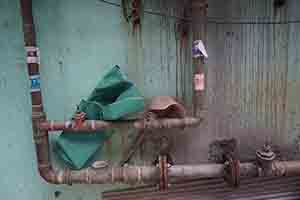 Wall with pipes in an alleyway, Sham Shui Po, Kowloon, 28 January 2017
