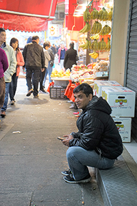 Man sitting on the street, Sham Shui Po, 28 January 2017