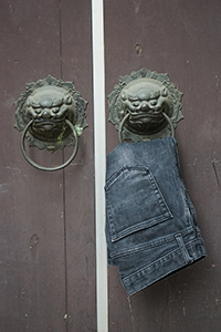Jeans hanging on a door of the Tin Hau Temple, Sham Shui Po, 28 January 2017
