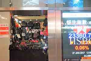 Pop up handbag stall in front of a bank entrance,  Mongkok, 28 January 2017
