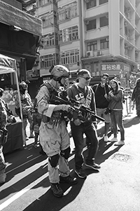 People dressed as soldiers at a street fair, Morrison Street, Sheung Wan, 1 January 2017