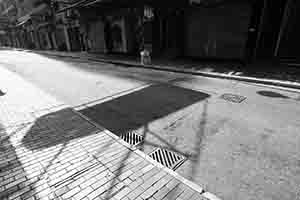 Shadow of a business sign, Wing Lok Street, Sheung Wan, 12 February 2017