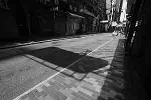 Shadow of a business sign, Wing Lok Street, Sheung Wan, 12 February 2017