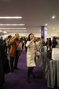 Audience members taking photos after a performance of 'Hong Kong Odyssey',  Hong Kong City Hall, Central, 26 February 2017