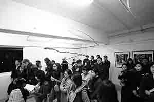 Guests at an exhibition opening, Para Site art space, King's Road, Quarry Bay, 17 March 2017