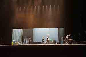 Workers preparing the stage in the Cultural Centre Grand Theatre for a performance by Tanztheater Wuppertal Pina Bausch of Rite of Spring, 8 March 2017