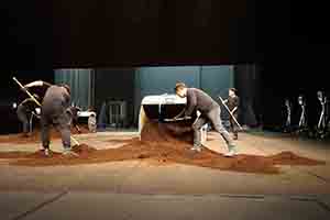 Workers preparing the stage in the Cultural Centre Grand Theatre for a performance by Tanztheater Wuppertal Pina Bausch of Rite of Spring, 8 March 2017