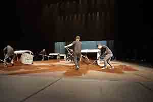 Workers preparing the stage in the Cultural Centre Grand Theatre for a performance by Tanztheater Wuppertal Pina Bausch of Rite of Spring, 8 March 2017