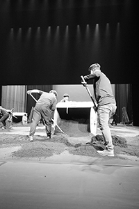 Workers preparing the stage in the Cultural Centre Grand Theatre for a performance by Tanztheater Wuppertal Pina Bausch of Rite of Spring, 8 March 2017