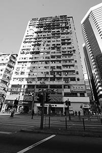 Street scene with shadows on a building, King's Road, Quarry Bay, 1 April 2017