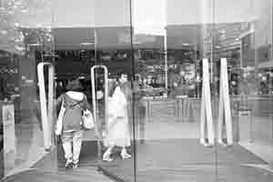 Entrance to the Pacific Place shopping centre, with reflections of Queensway, Admiralty, 20 April 2017