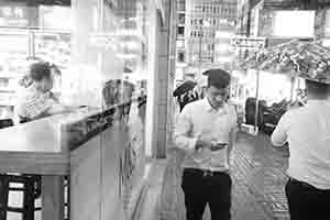 Reflection on a Marks & Spencer store window , Lock Road, Tsim Sha Tsui, 21 April 2017