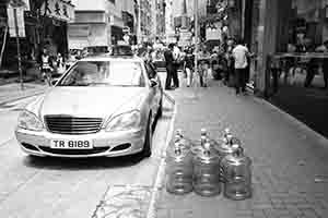 Empty water bottles on the street, Wing Lok Street, Sheung Wan, on 18 May 2017