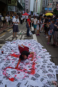 Protest performance, annual pro-democracy march from Victoria Park, Hennessy Road, Wanchai, 1 July 2017