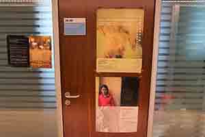 Exhibition posters on an office door, Run Run Shaw Tower, University of Hong Kong, Pokfulam, 7 July 2017