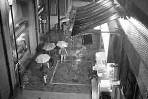 Street scene in rainy weather, Sheung Wan, 17 July 2017
