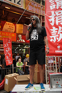 Leung Kwok-hung raising funds for the League of Social Democrats, annual pro-democracy march from Victoria Park, Hennessy Road, Wanchai, 1 July 2017