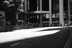 Light and shadow on the street, at the junction of Pedder Street and Queen's Road Central, Central, 20 August 2017