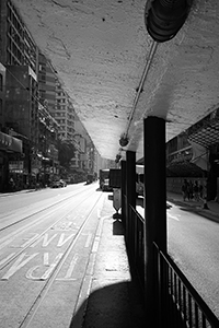 Light and shadow at a tram stop on Des Voeux Road West, Sheung Wan, 20 August 2017