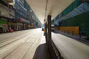 Light and shadow at a tram stop on Des Voeux Road West, Sheung Wan, 20 August 2017
