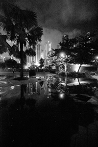 Water puddle with reflections, in Sun Yat Sen Memorial Park, Sheung Wan, 23 August 2017