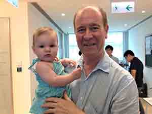 HKU academic Peter Cunich with his grandchild, Run Run Shaw Tower, HKU, Pokfulam, 4 August 2017