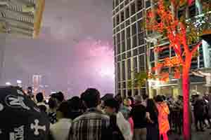 Crowd outside IFC mall viewing fireworks on national day, Central, 1 October 2017