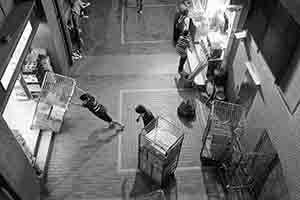 Workers transporting goods, off New Market Street, Sheung Wan, 18 November 2017