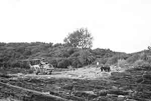 Helicopter conducting emergency medical evacation, Tung Ping Chau, Mirs Bay, 26 November 2017