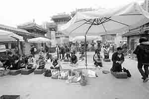 Praying at the temple, Wong Tai Sin, Kowloon, 30 January 2018