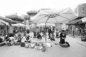 Praying at the temple, Wong Tai SIn, Kowloon, 30 January 2018