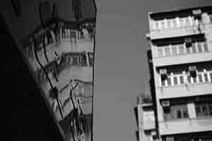 Reflection of buildings on a shop sign, Sham Shui Po, 16 February 2018