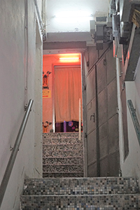 Neon light in a building, suggesting prostitution, Sham Shui Po, 16 February 2018