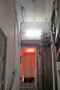 Neon light in a building, suggesting prostitution, Sham Shui Po, 16 February 2018