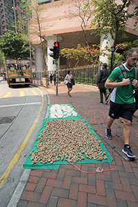 Goods airing on the street, Queen's Road West, Sheung Wan, 16 March 2018