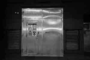 Wall with metal door, West Kowloon, 24 March 2018