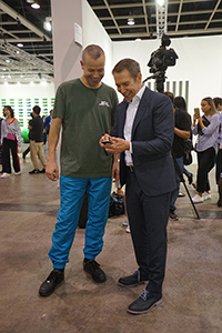 Wolfgang Tillmans (left) and Jeff Koons (right) at Art Basel Hong Kong, Convention and Exhibition Centre,  Wanchai, 27 March 2018