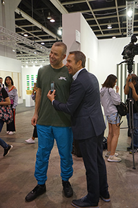 Wolfgang Tillmans (left) and Jeff Koons (right) at Art Basel Hong Kong, Convention and Exhibition Centre,  Wanchai, 27 March 2018