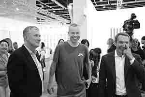 Wolfgang Tillmans (middle) and Jeff Koons (right) at Art Basel Hong Kong, Convention and Exhibition Centre,  Wanchai, 27 March 2018