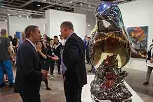 Jeff Koons (left) at Art Basel Hong Kong, Convention and Exhibition Centre,  Wanchai, 27 March 2018