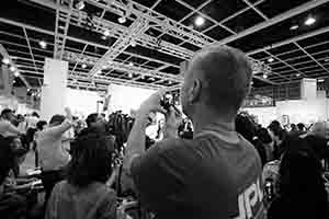 Wolfgang Tillmans taking a photo at Art Basel Hong Kong, Convention and Exhibition Centre, Wanchai, 27 March 2018