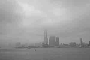 Victoria Harbour and the International Commerce Centre on a cloudy day, 20 April 2018