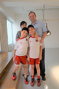 Tobias Berger and Yuk King Tan with their sons at an exhibition, Osage Gallery, Kwun Tong, 29 April 2018