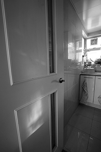 Kitchen door with patch of light, Sheung Wan, 11 June 2018