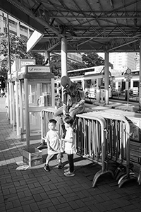 Spiderman with two children at the Star Ferry Pier, Tsim Sha Tsui, 30 June 2018