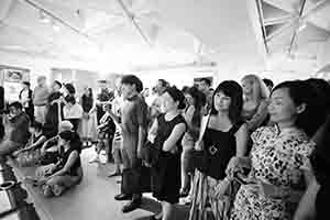 Audience watching performance art - part of the 'M+ Live Art: Audience as Performer' programme, Goethe Institut, Harbour Road, Wanchai,  1 June 2018