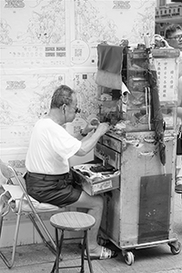 Street watch repair stall, Kowloon, 24 June 2018