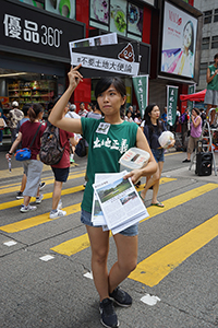 Participant in the annual pro-democracy march, Hennessy Road, Wanchai, 1 July 2018