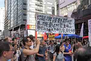 Participants in the annual pro-democracy march, Hennessy Road, Wanchai, 1 July 2018